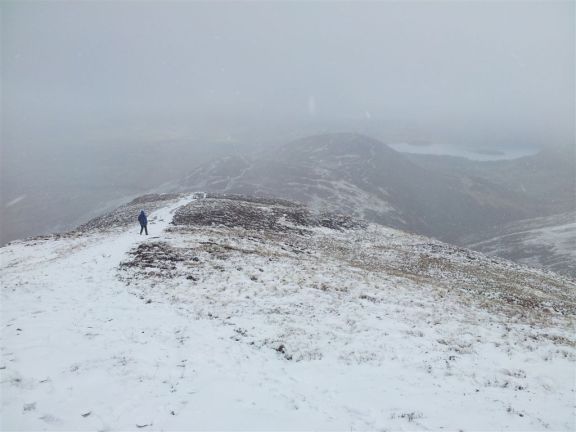 Snowing again whilst Alan descends Outerside Snowing again whilst Alan descends Outerside