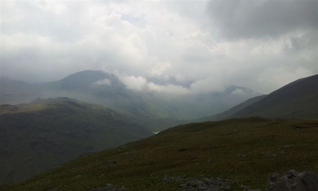 Moody shot of Great End & the Scafells with glimpse of Styhead Tarn in middle Moody shot of Great End & the Scafells with glimpse of Styhead Tarn in middle