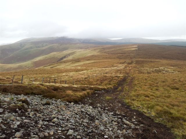 On way up Windy Gyle looking back over Border Gate to the lumpy Cheviot On way up Windy Gyle looking back over Border Gate to the lumpy Cheviot