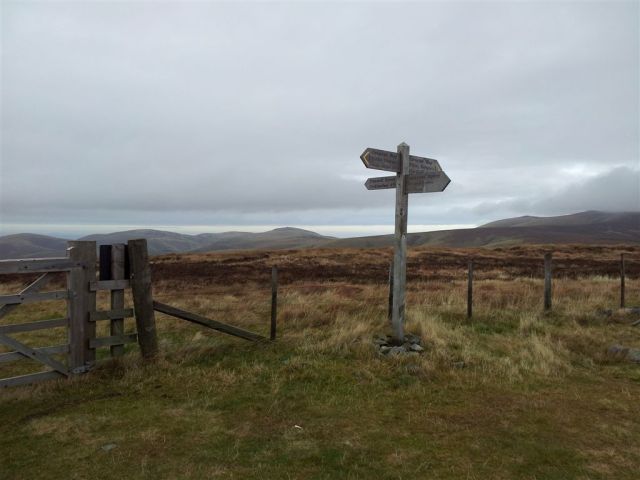 The Border Fence & sudden views over The Schill & cloudy Cheviot shoulder The Border Fence & sudden views over The Schill & cloudy Cheviot shoulder