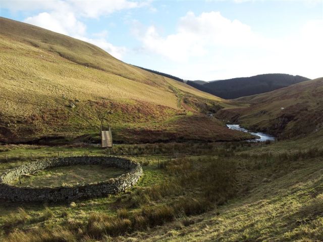 Turning back at last, over the bridge along Clennel St bridleway Turning back at last, over the bridge along Clennel St bridleway